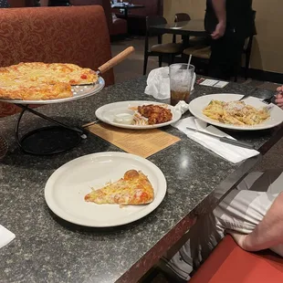 Cheese pizza, Spicy Buffalo Wings, and Chicken Parmesan