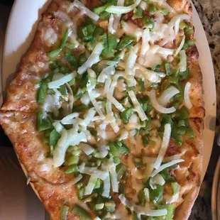 Pizza by the slice: Onion and Green Bell Pepper