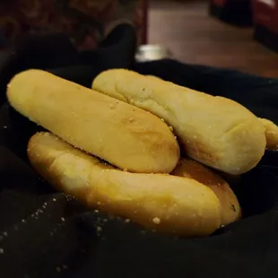 a basket of breadsticks