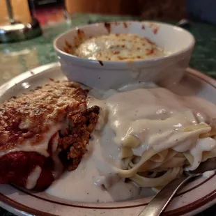 a plate of lasagna and pasta