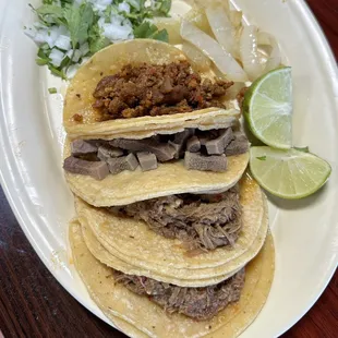 From the top: pastor, lengua, and barbacoa