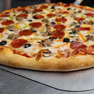 a pepperoni and olive pizza