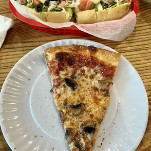 A toasted veggie sub and slice of mushroom pizza