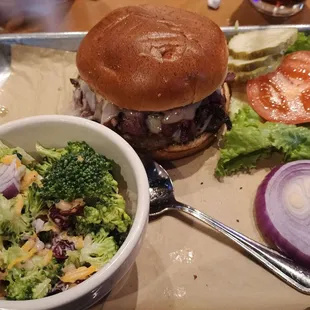 Pastrami Burger with broccoli piñon salad.