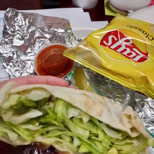 Wednesday lunch for $6.50. The taco  pocket with chips,  cookie or fruit and a soft drink.