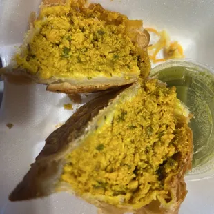 Chicken Samosa filled with goodness, but weak green sauce.