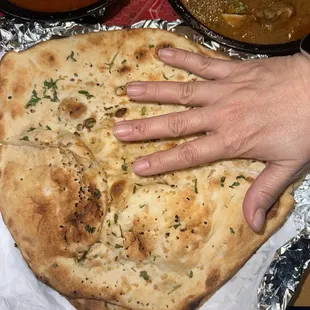 Garlic Naan three size bigger than my hand.