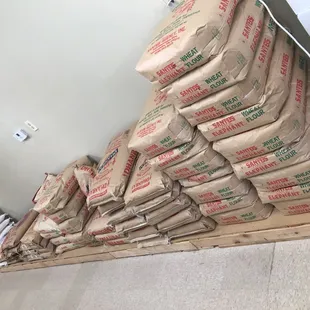 a stack of bags of rice