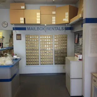 Store interior, post office boxes.