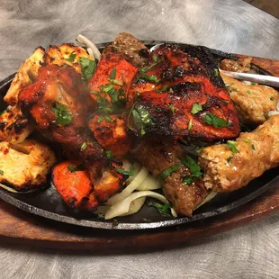 Mixed grill platter.  Chicken tikka, chicken boti, seekh kabob,