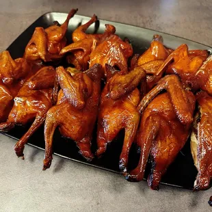 a platter of chicken wings