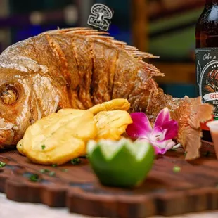 grilled fish with a beer