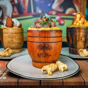 a wooden bowl of food