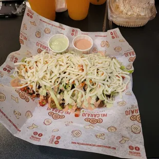 Patacon w/ Pernil. Fried green plantain open faced sandwich with pulled pork shoulder