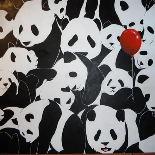 Pandas with red balloon