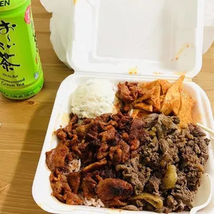 beef and rice in a styrofoam container