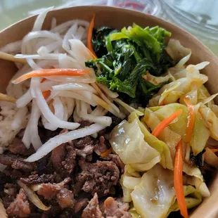 a bowl of beef and vegetables