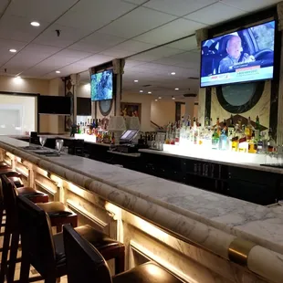 Marble bar with premium mixed drinks.