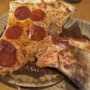 two slices of pizza on a plate