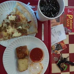 Meat pizza with garlic rolls and Cherry Coca-Cola was delicious.