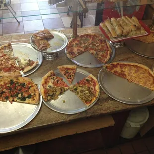 So many pizzas by the slice