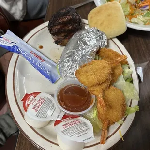 Surf and turf special with a baked potato.
