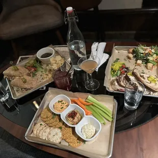 Left: Beef Dip and Kettle Chips Center: Dip-Trio of Pimento Cheese, Garlic Hummus, and Feta Whip Right: Reuben sandwich with Side Salad