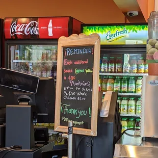 a menu board in a grocery store