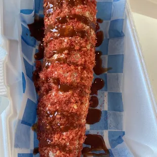 Elote entero con hot Cheetos