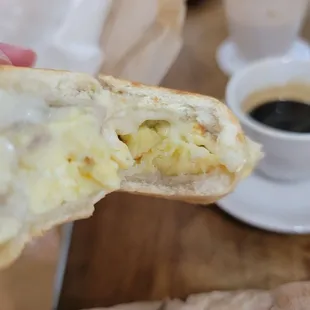 Ham, egg &amp; cheese on a Cuban bread with a colada!