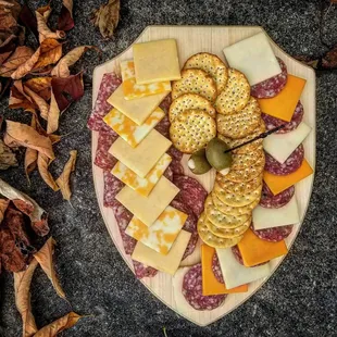 a platter of cheese and crackers