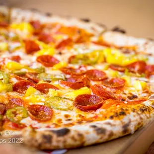 "Hawaiian" Pie House-made red sauce, shredded mozzarella, parmesan, Ezzo pepperoni, fresh pineapple, and pickled jalapeño.