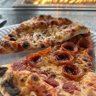 two slices of pizza on a plate