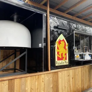 The oven closer up with the cart