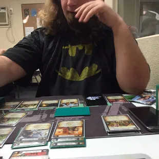 Ryan and I playing L5R in the back room area.