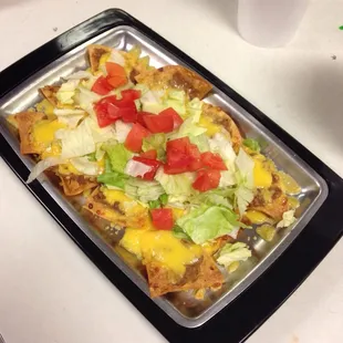 Try their nachos! They&apos;re delicious! We got ours with beans, cheese, lettuce and tomato, but they have an option for beef also!
