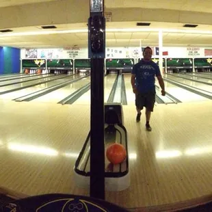 Panoramic of the lanes and my boyfriend walking away after a sweet strike!