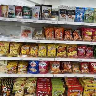 a variety of snacks on a shelf
