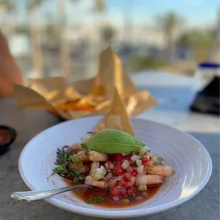 a white plate with a salad on it