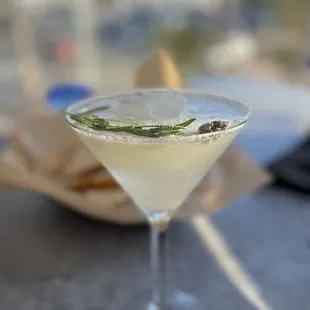 a martini with a lime garnish garnish garnish garnish garnish garnish ga