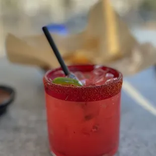 a drink with a straw in a glass