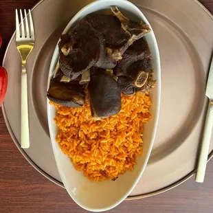 a plate of rice and vegetables