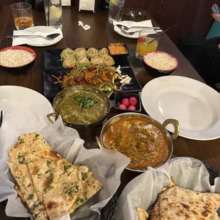 Garlic naan, cheese naan, butter chicken, palak Kofta