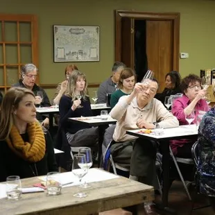 a group of people sitting at tables