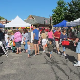 people shopping at stalls