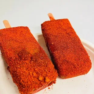 two pops on a white plate