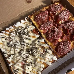 Double pepperoni pizza and carbonara pizza