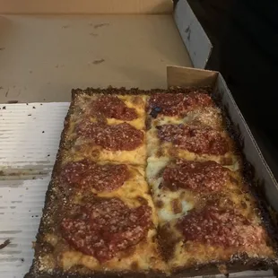 Top of a "double sauce cheese and pepperoni pizza"