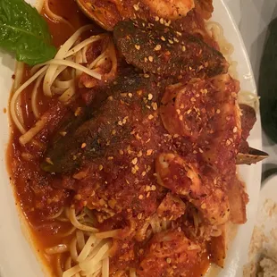 Seafood combination with red sauce