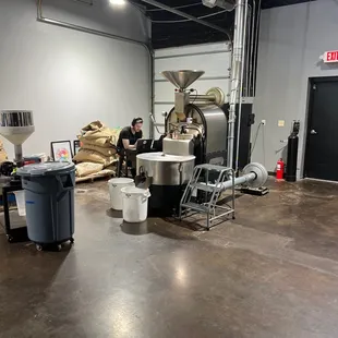 a coffee roaster in a warehouse